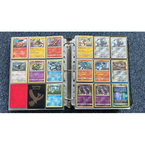 403 - A folder containing duplicates of Pokemon cards. Various sets and series including Base Set, Ultra P... 