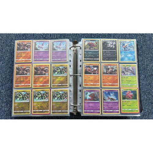 403 - A folder containing duplicates of Pokemon cards. Various sets and series including Base Set, Ultra P... 