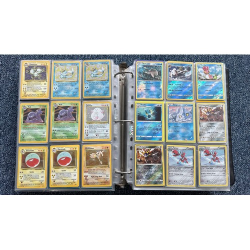 403 - A folder containing duplicates of Pokemon cards. Various sets and series including Base Set, Ultra P... 