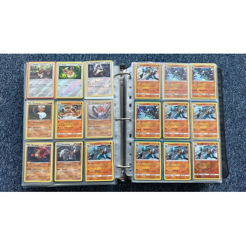 403 - A folder containing duplicates of Pokemon cards. Various sets and series including Base Set, Ultra P... 