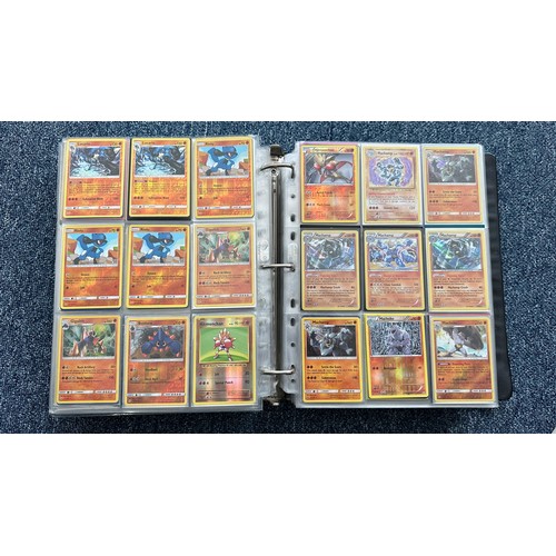 403 - A folder containing duplicates of Pokemon cards. Various sets and series including Base Set, Ultra P... 