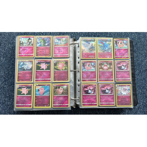 403 - A folder containing duplicates of Pokemon cards. Various sets and series including Base Set, Ultra P... 