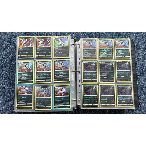 403 - A folder containing duplicates of Pokemon cards. Various sets and series including Base Set, Ultra P... 