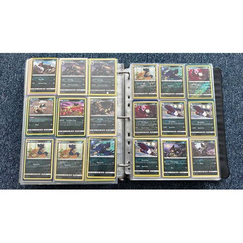 403 - A folder containing duplicates of Pokemon cards. Various sets and series including Base Set, Ultra P... 