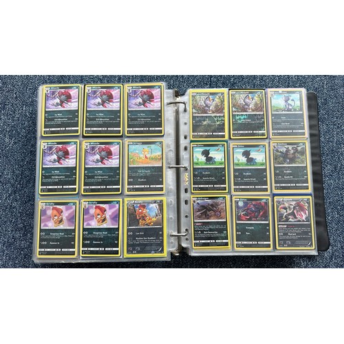 403 - A folder containing duplicates of Pokemon cards. Various sets and series including Base Set, Ultra P... 