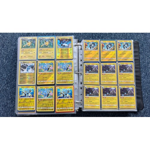 403 - A folder containing duplicates of Pokemon cards. Various sets and series including Base Set, Ultra P... 