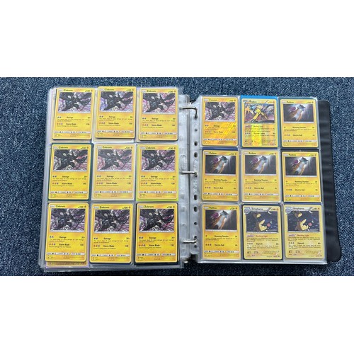 403 - A folder containing duplicates of Pokemon cards. Various sets and series including Base Set, Ultra P... 