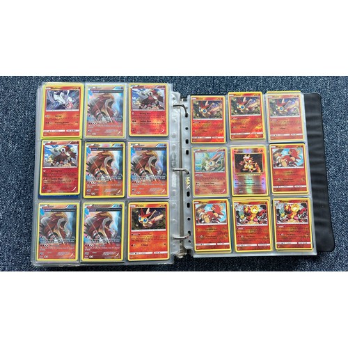 403 - A folder containing duplicates of Pokemon cards. Various sets and series including Base Set, Ultra P... 