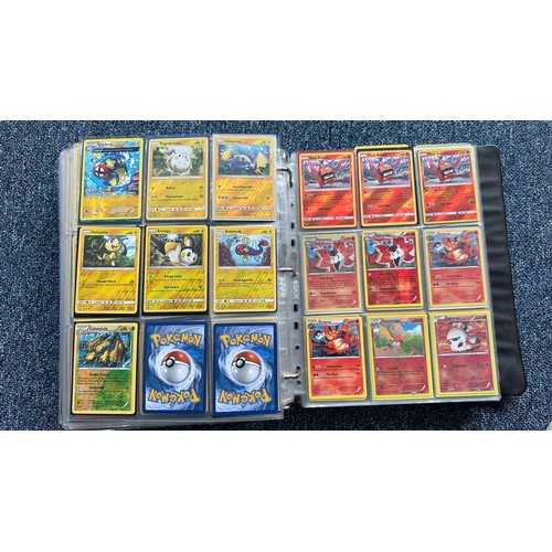 403 - A folder containing duplicates of Pokemon cards. Various sets and series including Base Set, Ultra P... 