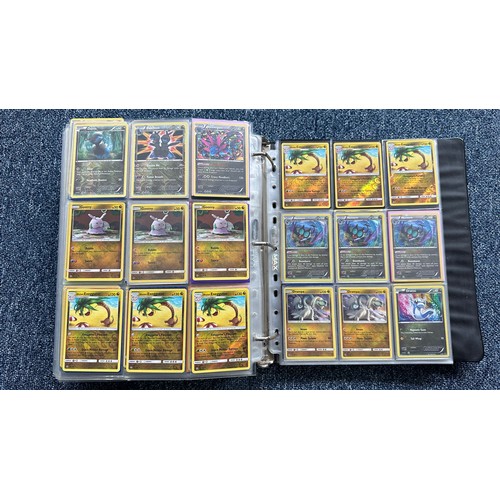 403 - A folder containing duplicates of Pokemon cards. Various sets and series including Base Set, Ultra P... 