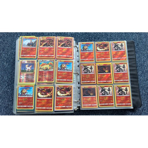 403 - A folder containing duplicates of Pokemon cards. Various sets and series including Base Set, Ultra P... 