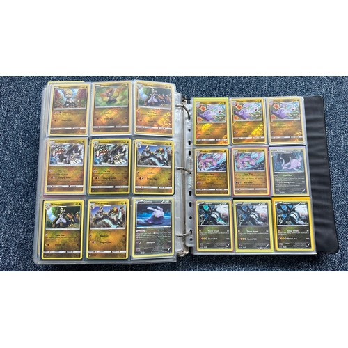 403 - A folder containing duplicates of Pokemon cards. Various sets and series including Base Set, Ultra P... 