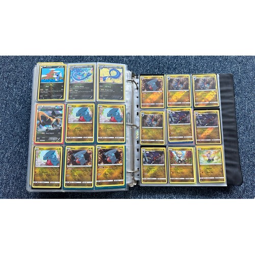 403 - A folder containing duplicates of Pokemon cards. Various sets and series including Base Set, Ultra P... 