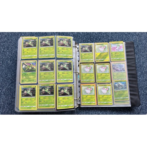 403 - A folder containing duplicates of Pokemon cards. Various sets and series including Base Set, Ultra P... 