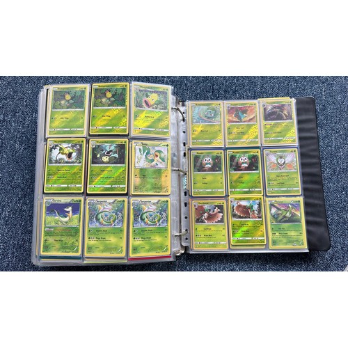 403 - A folder containing duplicates of Pokemon cards. Various sets and series including Base Set, Ultra P... 