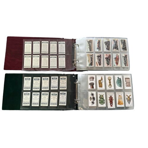 295 - A collection of cigarette cards, sleeved in 4 albums with some loose, in variable condition, includi... 