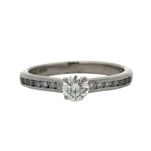 73 - A platinum and diamond ring set with a central diamond of 0.3ct approx colour E, VS2 clarity. Should... 