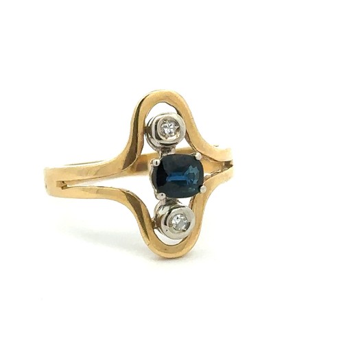 63 - 18ct yellow gold, sapphire and diamond ring in an unusual setting. Size K. Weight 3.05g.
Please see ... 