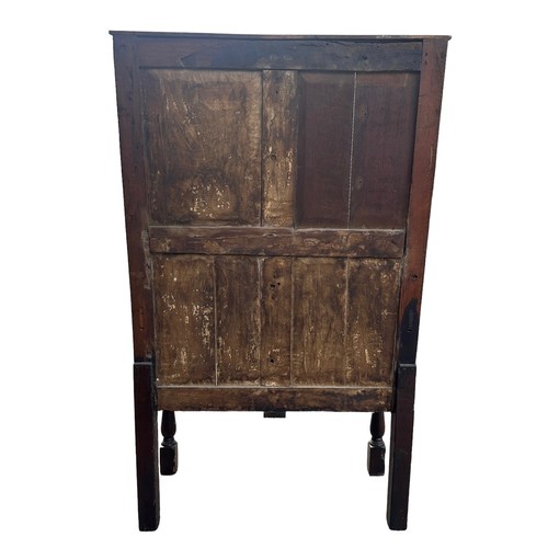 405 - 18th Century English oak settle, circa 1725 made from a wall panel, later seat lid. Width 94cm, dept... 