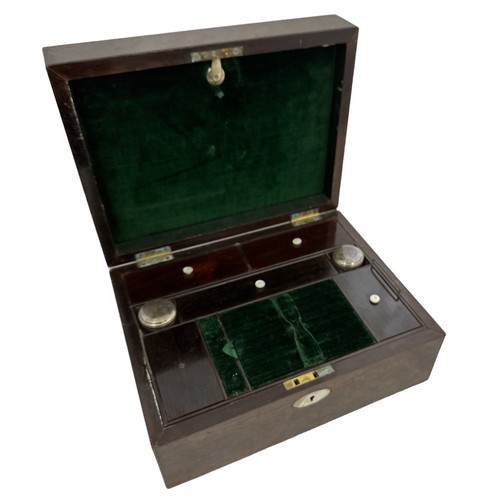 257 - A vintage writing slope with mother of pearl inlay and green velvet interior. Internal compartments ... 