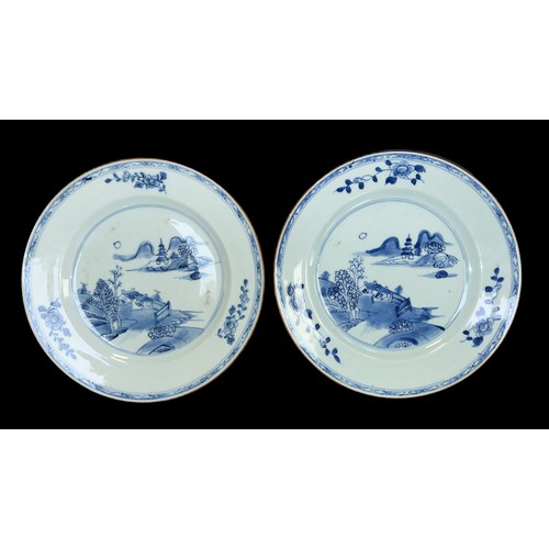 359 - 18th / 19th pair of fine blue and white Chinese plates, landscape interior decoration with floral ex... 