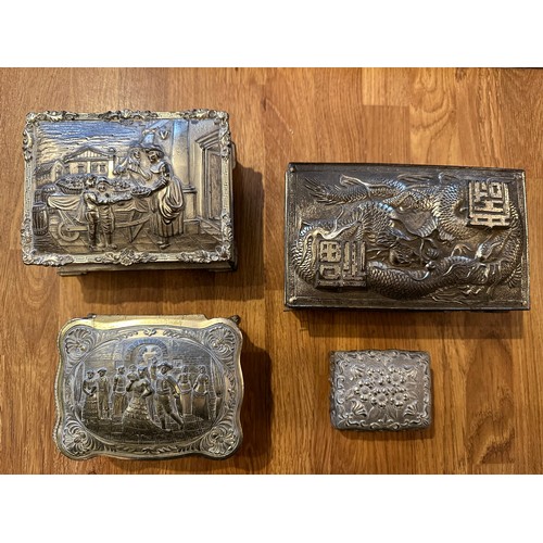 255 - Four white metal trinket boxes with embossed decoration. Some of the hinges are in need repair - ple... 