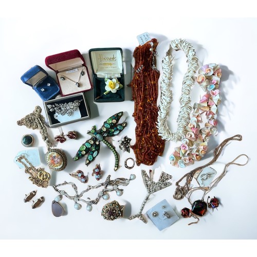 64 - Some silver and costume jewellery pieces, including a large vintage Butler and Wilson dragonfly broo... 