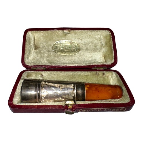 180 - Early 20th Century block amber and silver cheroot holder in original case (missing its pair). Foliat... 