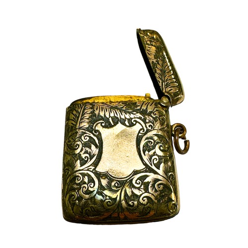 210 - Rolled Gold vesta case, with foliate spiral engraved decoration, with ring pull. Space in decoration... 