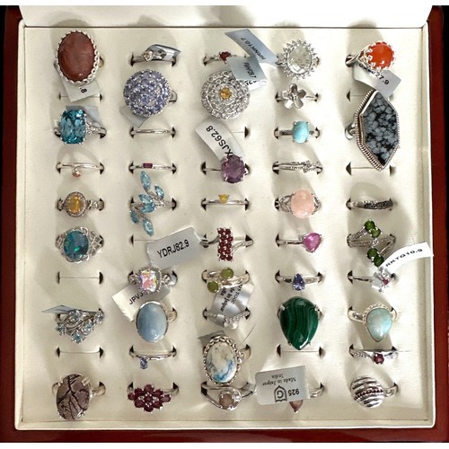 82 - A polished wood Gemporia ring box containing 43 silver and gem set rings, many with their Gemporia t... 