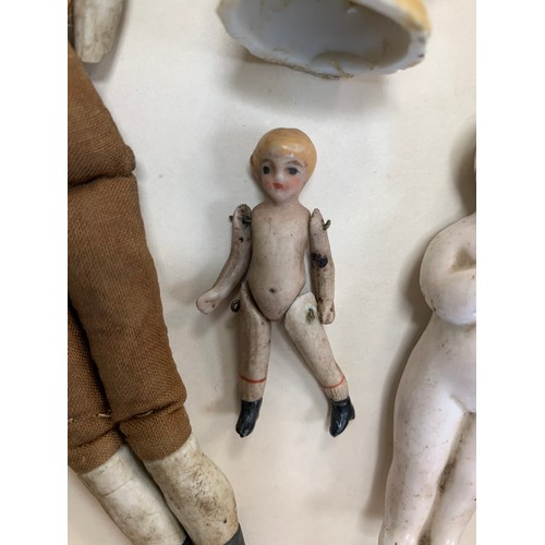 272 - Small selection of four antique dolls to include; Antique Miniature bisque pin jointed doll (likely ... 