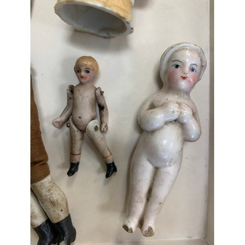 272 - Small selection of four antique dolls to include; Antique Miniature bisque pin jointed doll (likely ... 