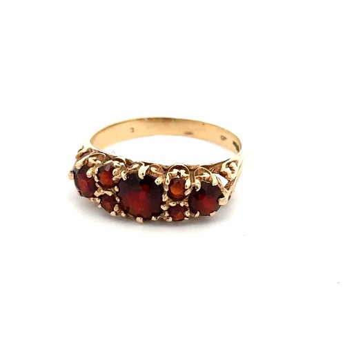 57 - A 9ct gold and garnet ring, size M. Weight 1.94g
Please see the buyer's terms and conditions for pur... 