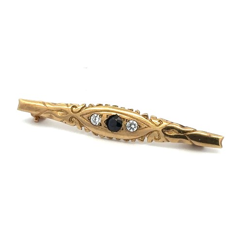 70 - A hallmarked 9ct gold three stone brooch set with blue and white stones. Length 44mm. Weight 2.2g.
P... 