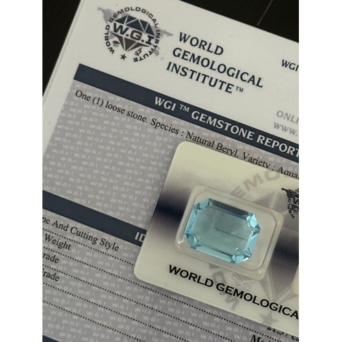 99 - A large loose unmounted aquamarine gemstone in a WGI (World Gemological Institute) sealed packet and... 