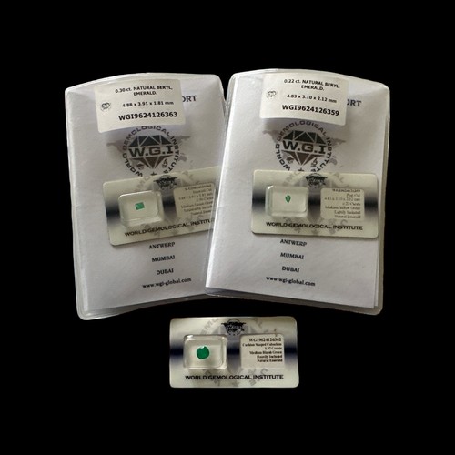 101 - Three loose unmounted emerald gemstones in WGI (World Gemological Institute) sealed packets. Emerald... 