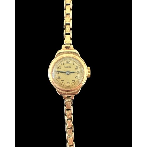 127 - A Bernex 9ct gold watch with Arabic numerals and outer minute track  Case diameter 18mm. Case with C... 