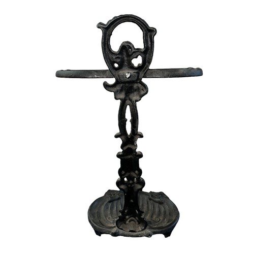 304 - Wrought Iron Stick Stand in good order. Height 56cm.