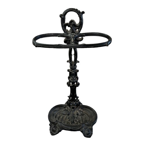 304 - Wrought Iron Stick Stand in good order. Height 56cm.