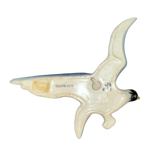 230 - Beswick, flat backed ceramic black headed flying seagull wall plaque. With Beswick stamp to reverse ... 