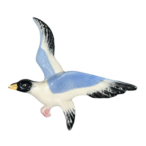 230 - Beswick, flat backed ceramic black headed flying seagull wall plaque. With Beswick stamp to reverse ... 