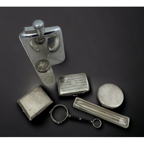 188 - An assortment of silver and white metal items: Two hallmarked silver compacts with engine turned pat... 