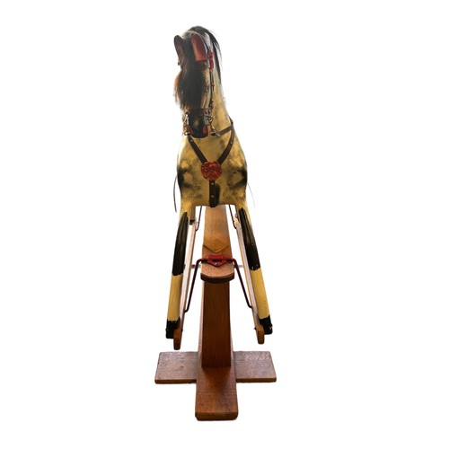 403 - Collinson & Son of Liverpool, Early 20th Century hand painted rocking horse on a trestle base by J. ... 