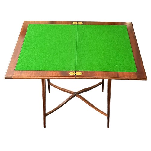 409 - Edwardian lift and twist rectangular topped crossbanded satinwood games table, height 71cm, top  76.... 