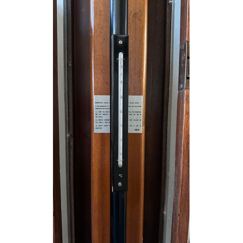 298 - A scientific stick barometer in fitted case by F. Darton & Co. Height 125cm.