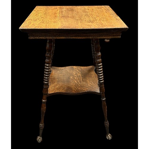 411 - Late 19th Century oak two-tier table, probably American, terminating on claw and glass ball feet. He... 