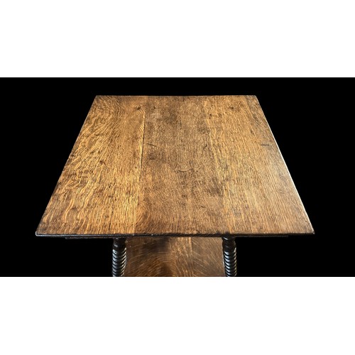 411 - Late 19th Century oak two-tier table, probably American, terminating on claw and glass ball feet. He... 