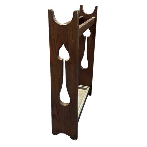 413 - Arts & crafts stick stand. H77cm, W53.5cm.