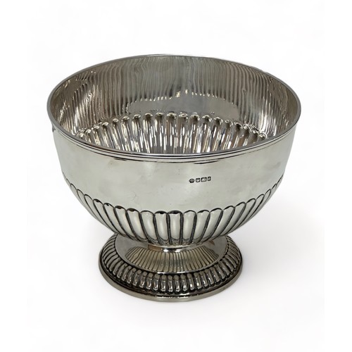 203 - A circular late Victorian silver rose bowl with half lobed body on a lobed circular pedestal foot. W... 