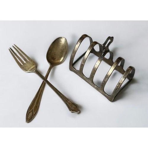 206 - A silver toast rack,  William Bruford & Son, London 1934. Also a 1930s silver spoon and fork. Weight... 